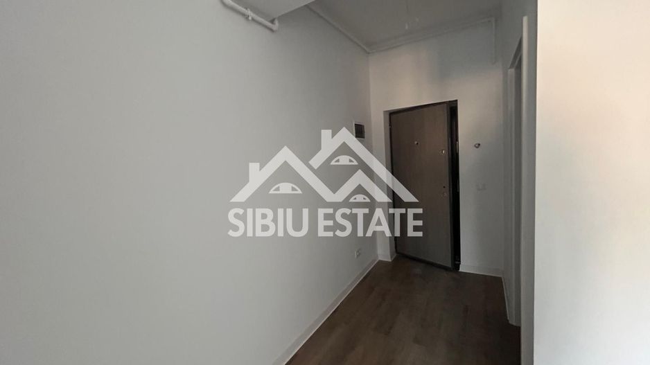 Garsoniera 41 mp, balcon bucatarie separata , intabulata zona Brana - Poză 23