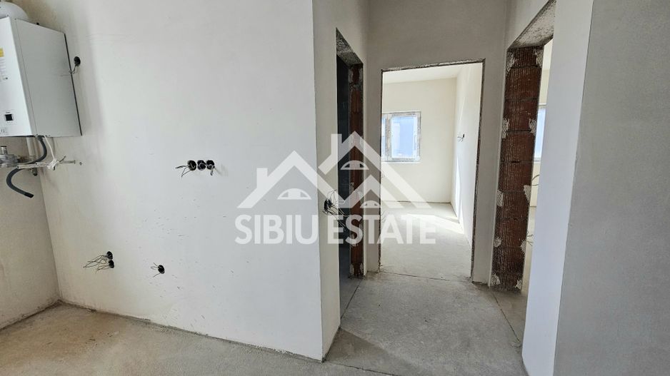 Apartament 3 camere, 2 bai, etaj 1 Selimbar - Poză 4