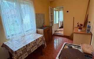Casă cu teren generos în Buciumi - Poză 6