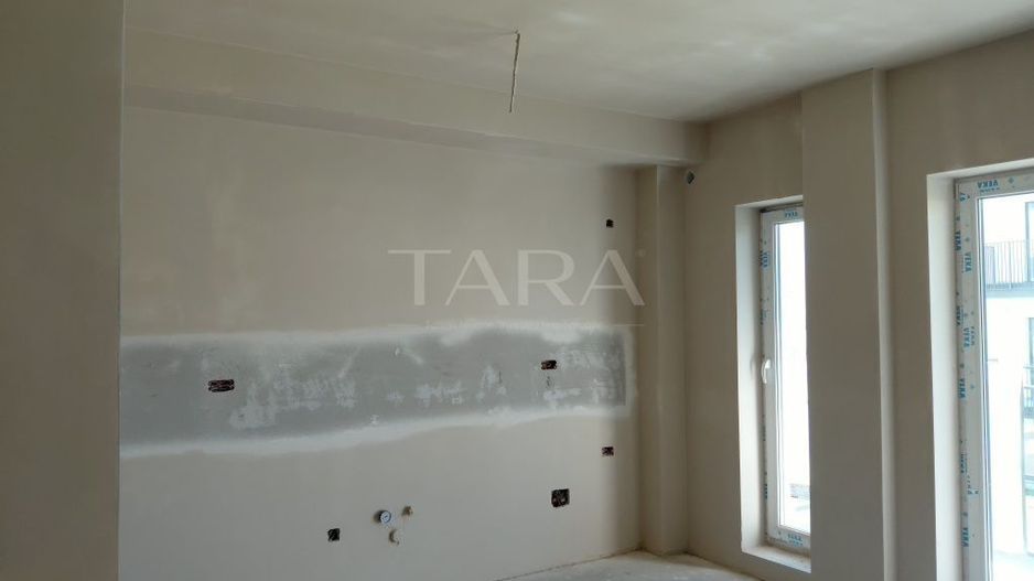 Apartament open-space cu nișă de dormit, CF și parcare subterană. - Poză 1