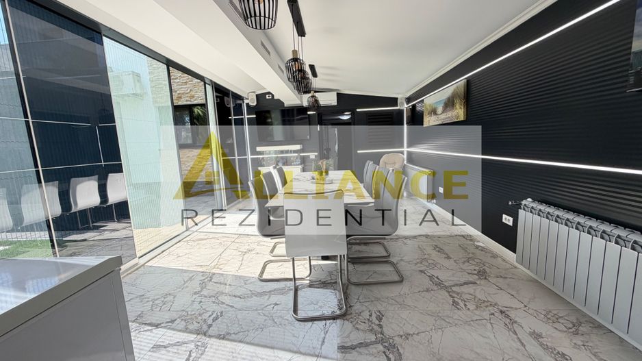 Casa P+1+M cu teren de 650 mp, piscina si curte complet amenajata - Poză 11