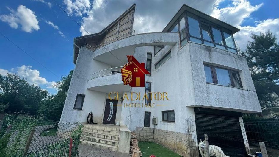 Vila cu terase, garaj si o gradina de vis pentru o familie fericita - Poză 1