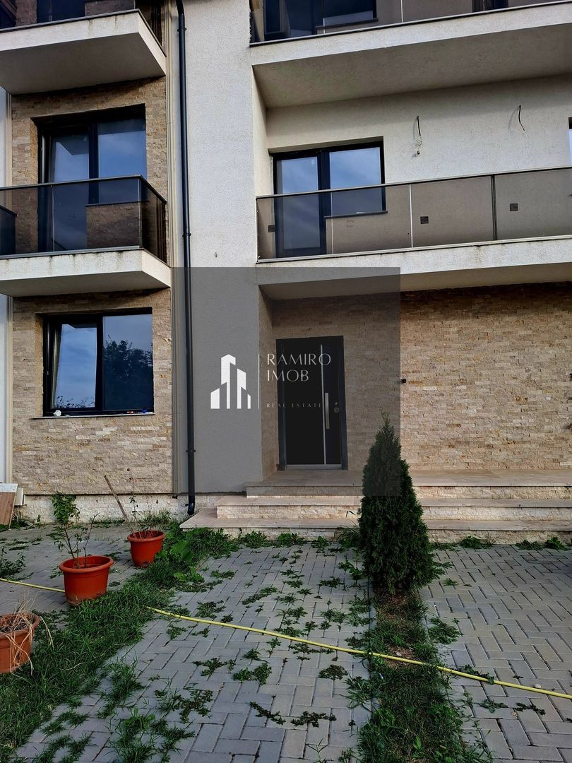 BUFTEA - APARTAMENT 3 CAMERE CU TRERASA SI CURTE. - Poză 2