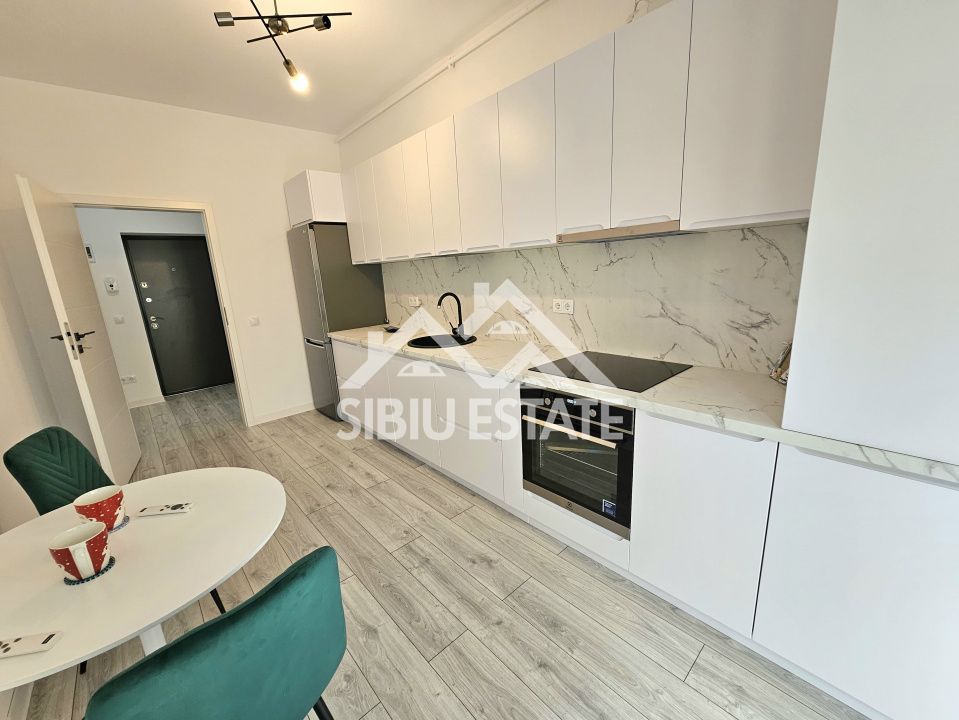 Studio 41 mp, balcon bucatarie separata , intabulata zona Brana - Poză 1