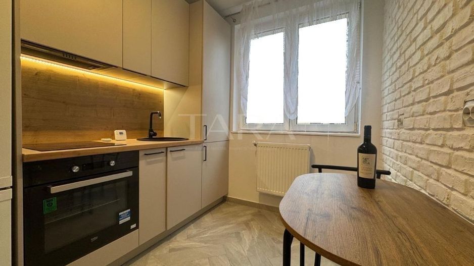 Apartament Modern cu 2 camere cu Acces la Curte - Poză 2