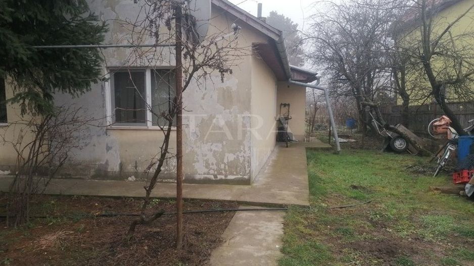 Casă de vânzare cu teren generos – zonă liniștită. Cartier Bulgaria. - Poză 1