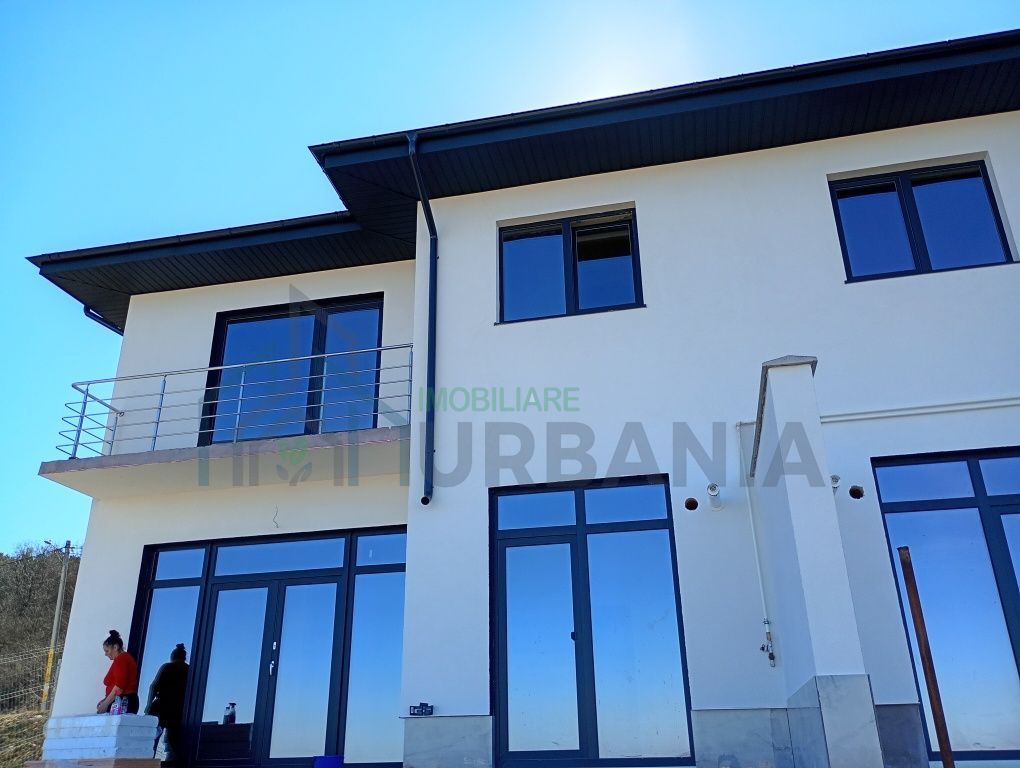 Casa tip duplex în tomesti - Poză 1