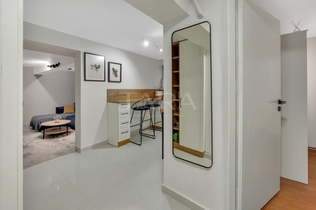 Garsonieră renovată integral, ideală pentru investiție sau regim hotel - Poză 4
