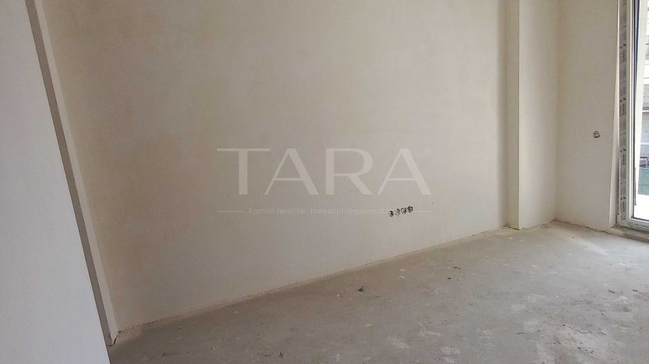 Apartament semifinisat cu terasă și parcare în Florești. - Poză 2