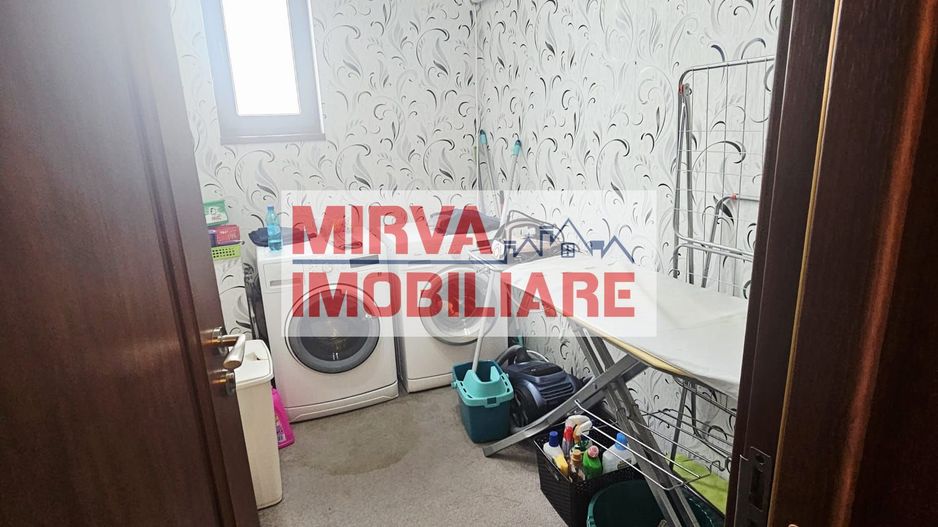 Vilă spațioasă Strejnicu S+P+1E+M, 8 camere, garaj, teren 595 mp - Poză 69