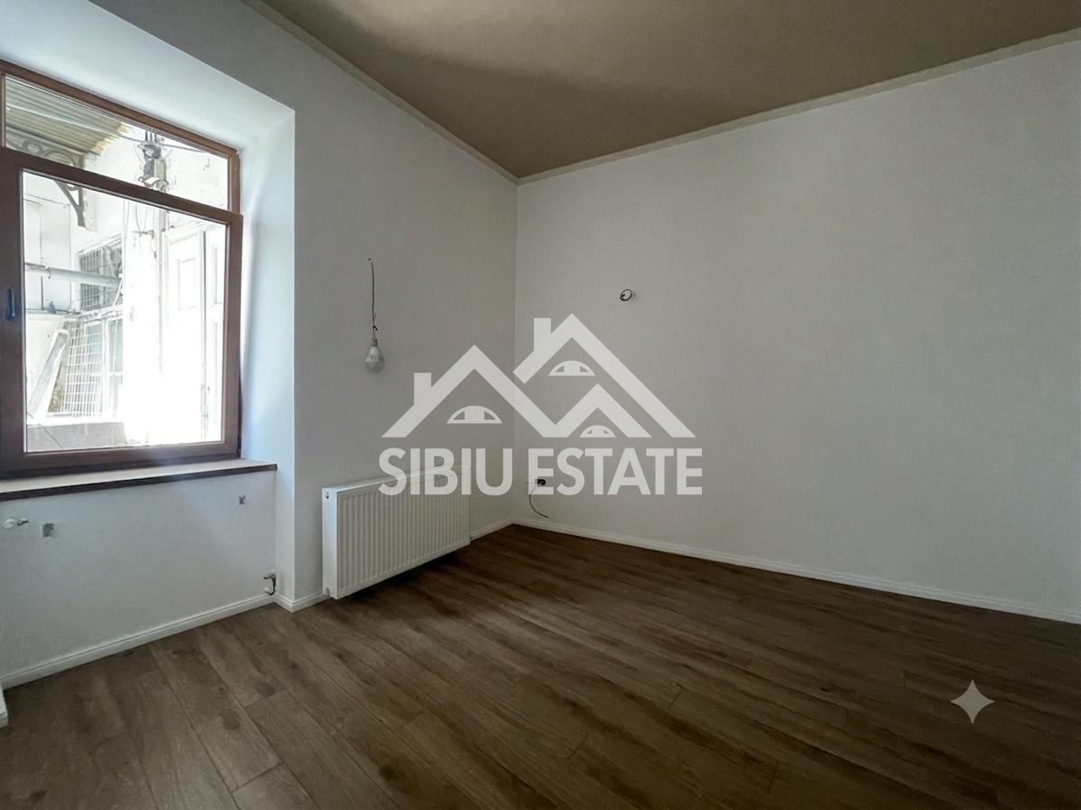 Apartament renovat, în inima Sibiului, pe strada Nicolae Bălcescu - Poză 10