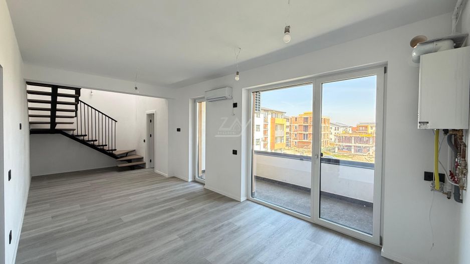 Ap pe 2 niveluri. 3 camere, 2 bai. 2 locuri de parcare. - Poză 1