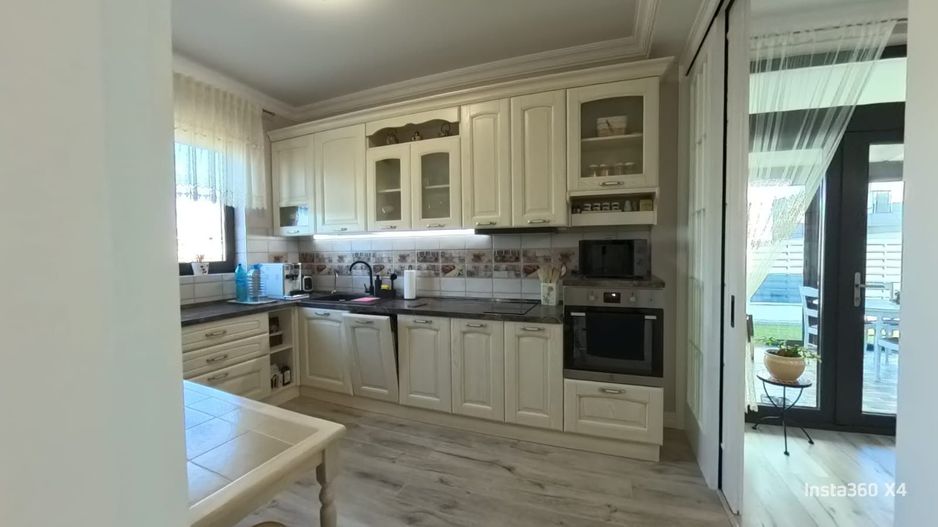 Casă complet mobilată și utilată, cu grădină amenajată | teren 500 mp - Poză 9