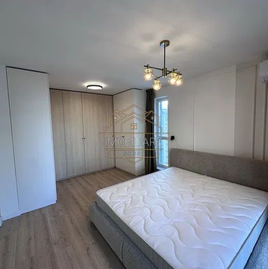 Apartament de închiriat cu 2 camere, aer condiționat, loc de parcare - Poză 2
