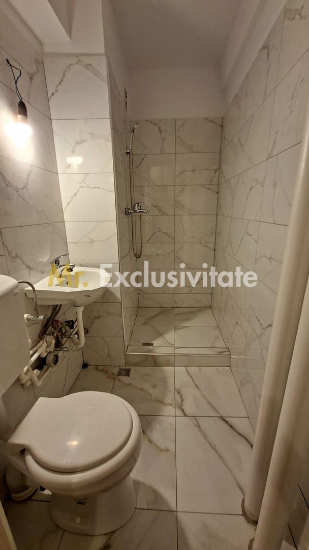 Garsoniera Craiovei etaj intermediar in bloc de apartamente - Poză 7