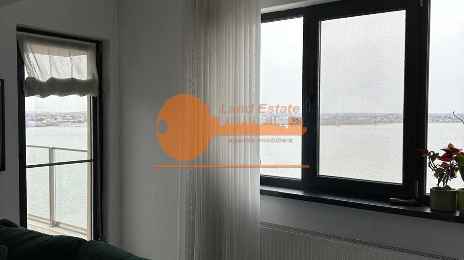 Vanzare 3 camere ( bloc 2020-loc parcare subteran inclus- vedere lac ) - Poză 5