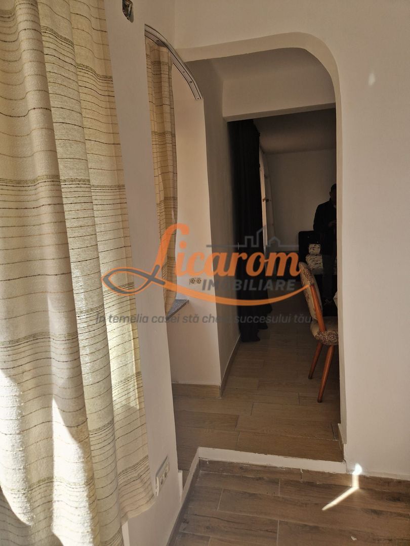 Garsoniera in casa str Iuliu Maniu curte comuna. - Poză 7