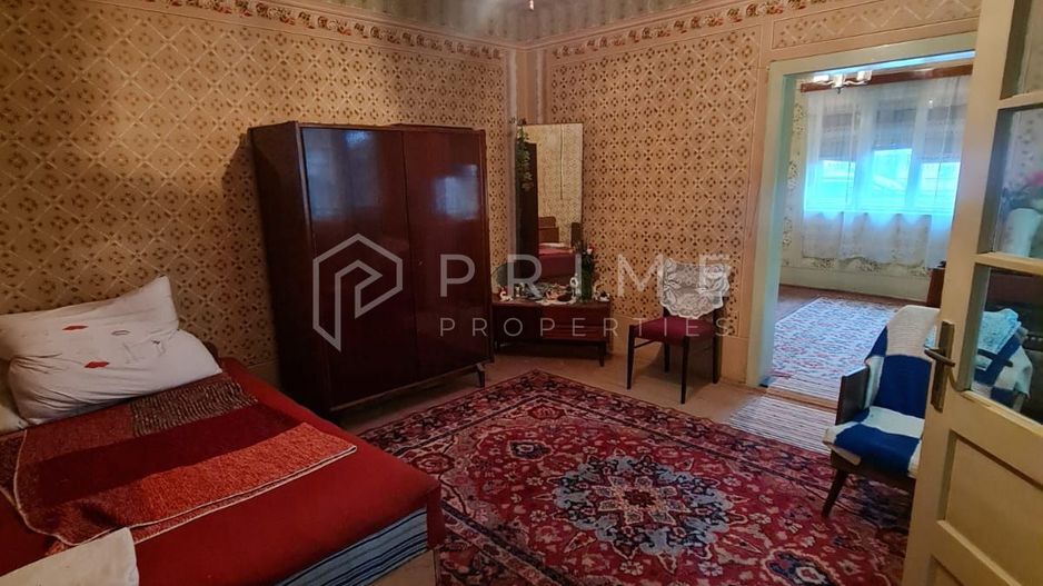 Casă cu teren de 1.000 m² – utilități complete, ideală pentru renovare - Poză 4