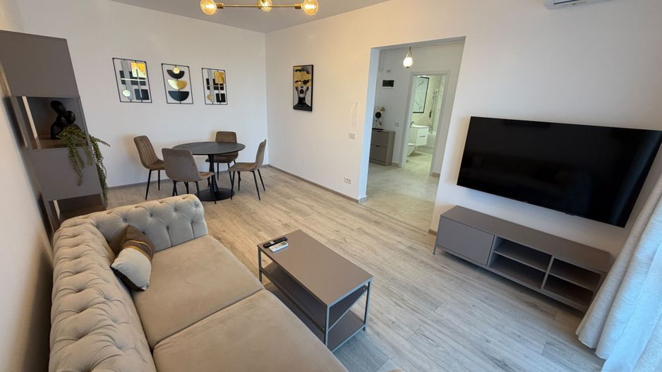 AP. 2 CAMERE- PARCARE INCLUSA, CENTRALA, BUCATARIE INCHISA, MODERN - Poză 1