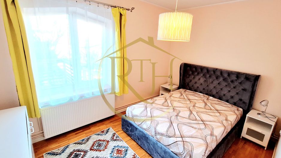 Oferim spre inchiriere un apartament cu 3 camere,modern, zona Spitalul Judetean - Poză 1