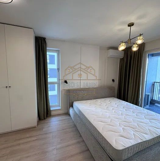 Apartament de închiriat cu 2 camere, aer condiționat, loc de parcare - Poză 1