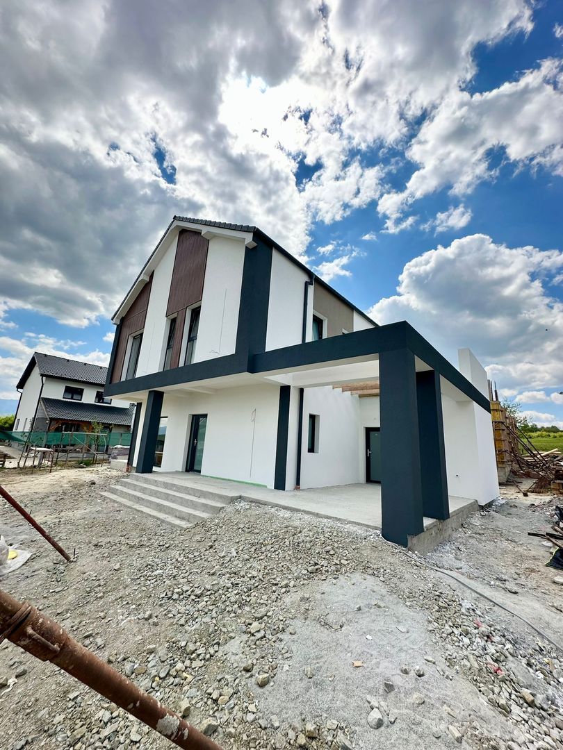 Casă single modernă, eficientă energetic și curte generoasă - Poză 2