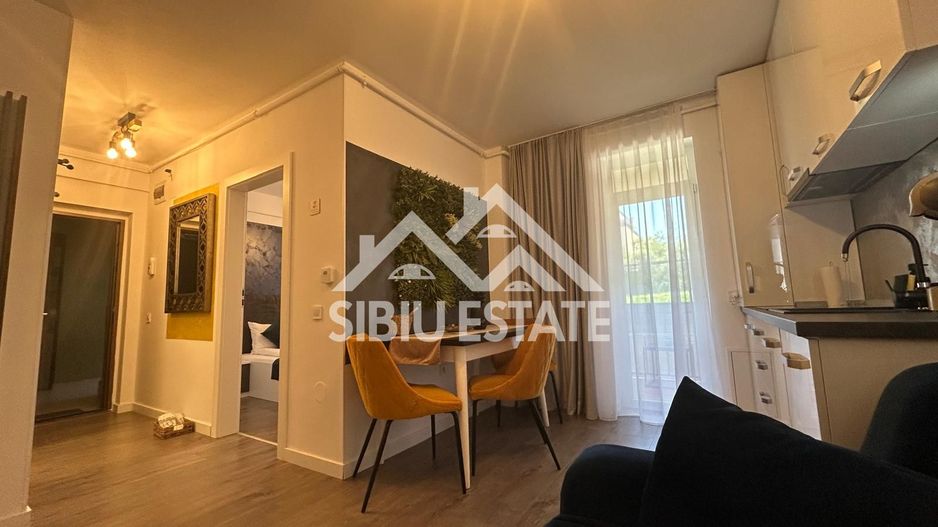 Apartament mobilat-utilat, cu 2 camere, balcon, parcare si boxa - Poză 7