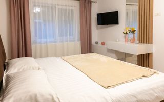 2 camere,  la 10-12 minute de Complex,  Sp. Judetean, centrala proprie - Poză 1