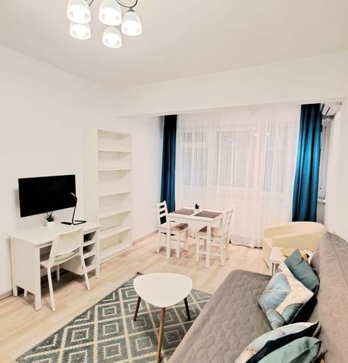 Studio de vanzare - Poză 2