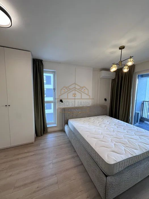 Apartament de închiriat cu 2 camere, aer condiționat, loc de parcare - Poză 1