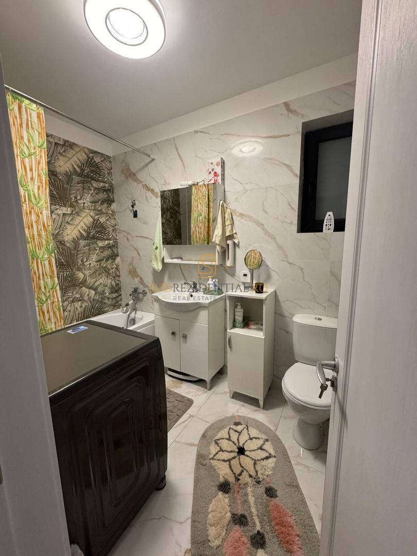 Vila modernă pe parter cu terasă închisă și pod pentru depozitare - Poză 8