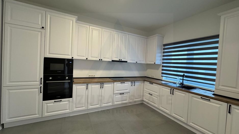 Casa individuala 114 utili 4 camere 2 bai si curte 215 mp in Selimbar - Poză 11