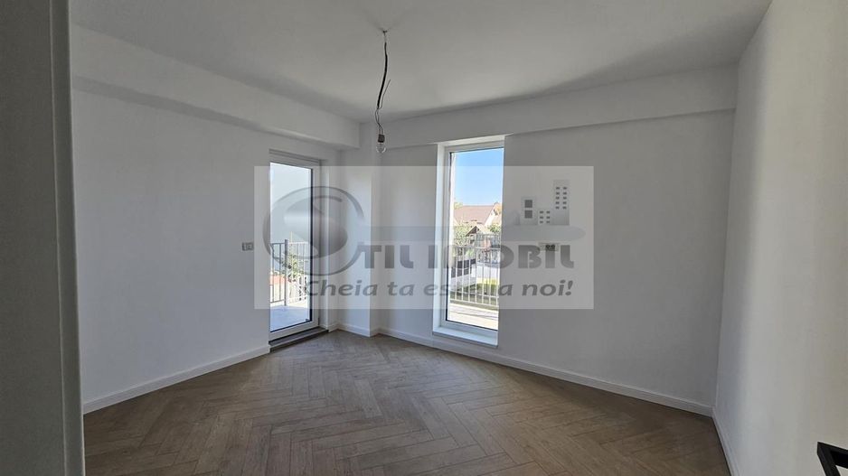 Apartament exclusivist dispus P+1E + curte 70mp - Poză 9