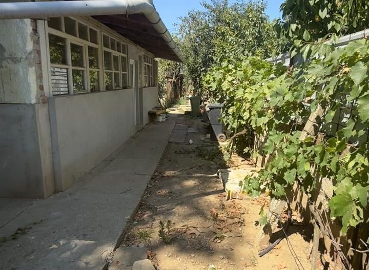 Casa Santandrei din caramida 250 mp teren - Poză 2