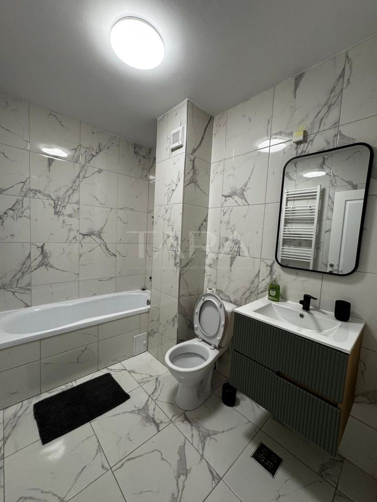Apartament 2 camere cu terasă de 40 mp - garaj subteran inclus. - Poză 7