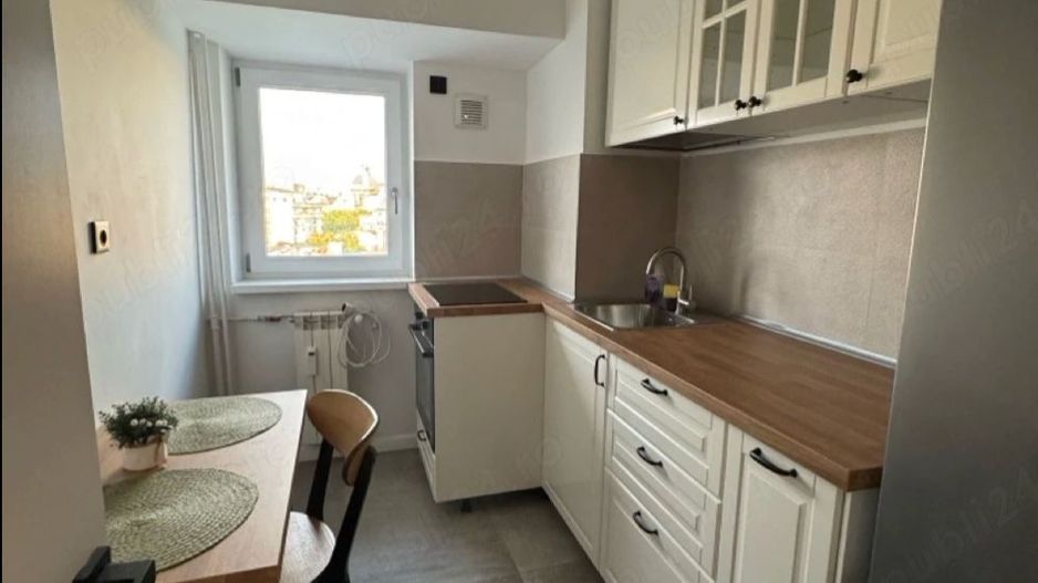 GARSONIERA - NATIUNILE UNITE, BUCATARIE INCHISA, MOBLATA MODERN - Poză 2