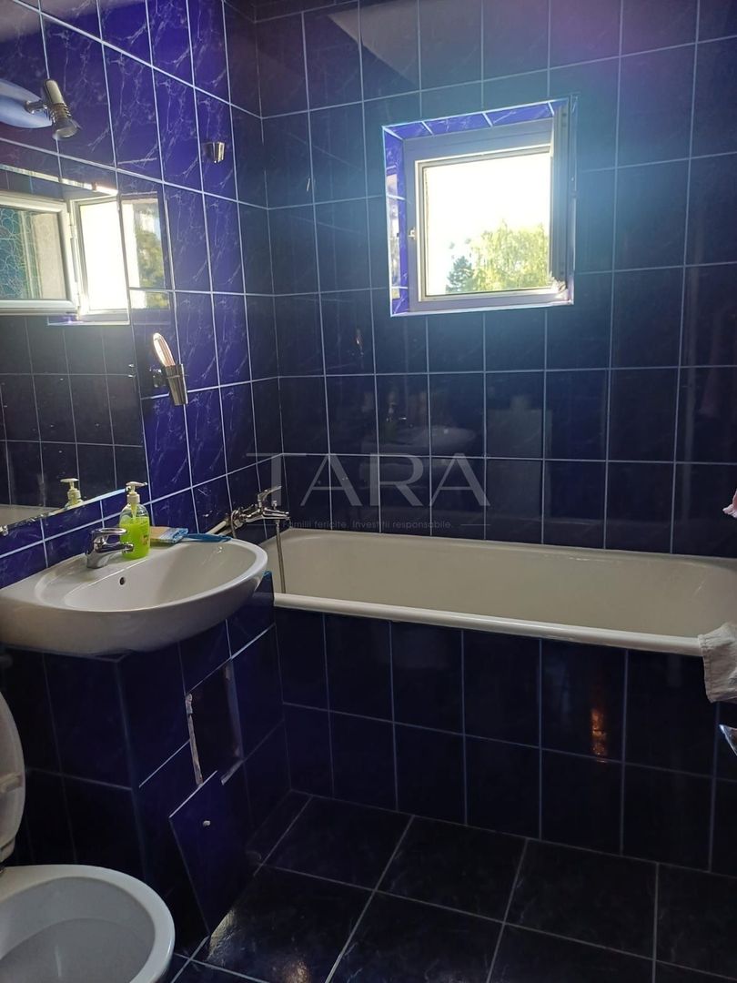 Apartament cu 3 camere, 2 băi, balcon și centrală proprie, zona Clăbuc - Poză 4
