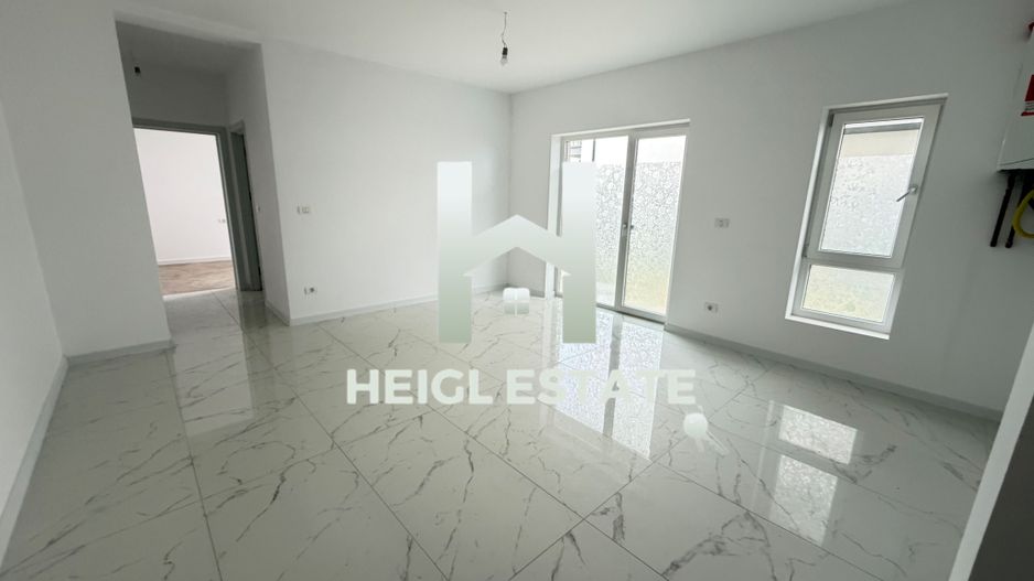 Apartament cu 2 camere si 50 mp teren in zona Braytim - Poză 3