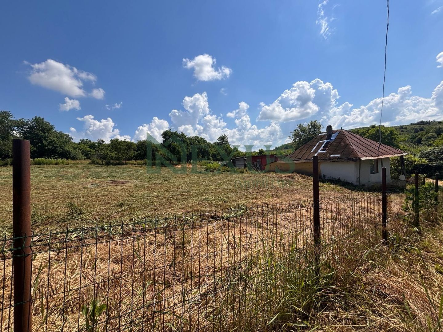 Casă bătrânească cu teren de 3.200 mp în Hertioana de Jos, jud.Bacău - Poză 14