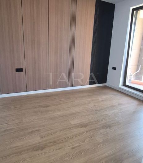 Apartament modern cu 2 camere, 54 mp + 4 mp, parcare subterană. - Poză 2