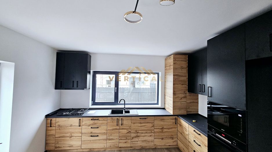 Casa 4 camere | 3 bai | centrul comunei Berceni - Poză 6