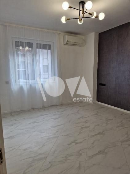 De închiriat Duplex 5 camere (parter + demisol) - vila Piata Romana - Poză 2