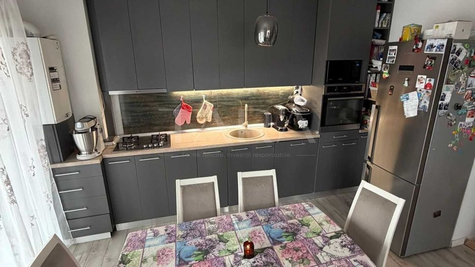 Apartament modern cu terasă generoasă și parcare subterană. - Poză 2