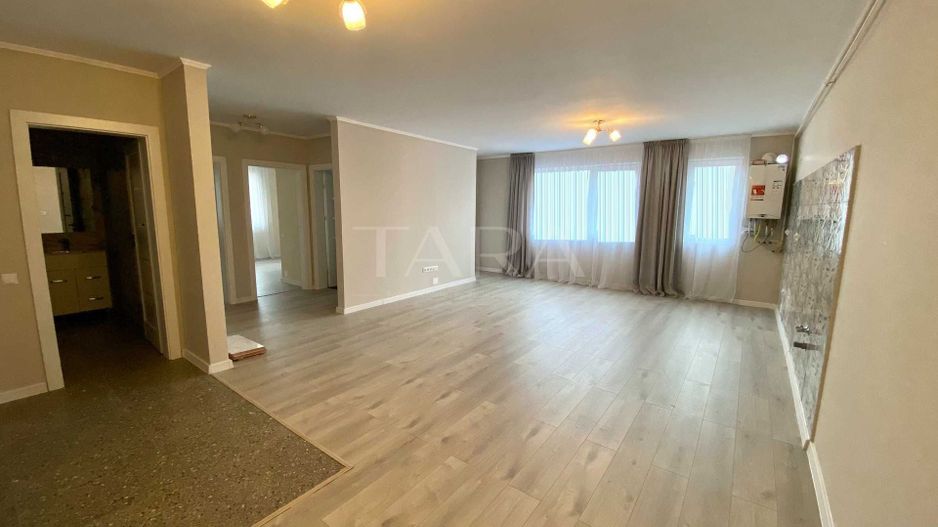 Apartament nou, 3 camere, ultim etaj, priveliște liberă – Floresti. - Poză 1