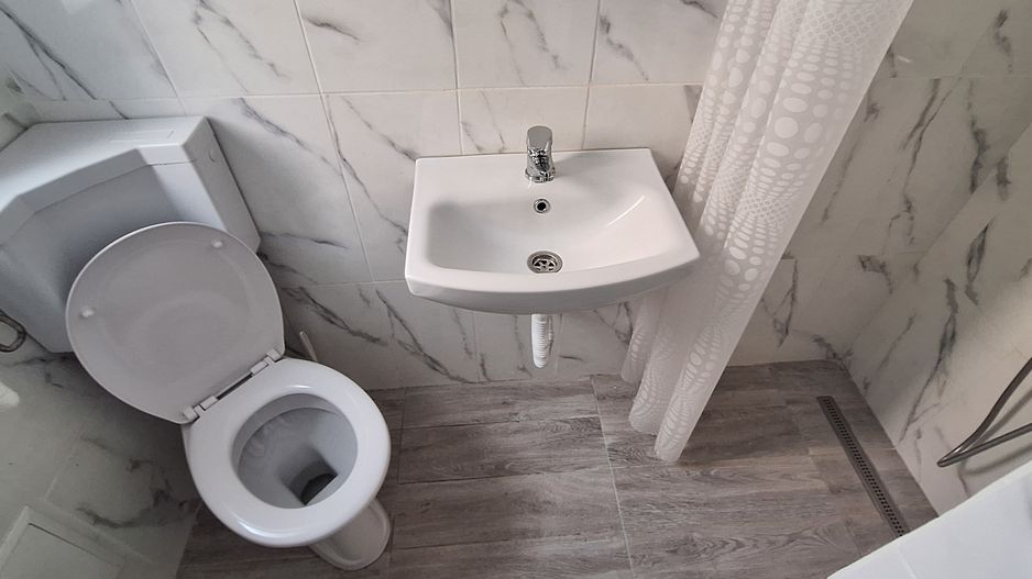 Apartament central cu o camera si loc de parcare - Poză 8