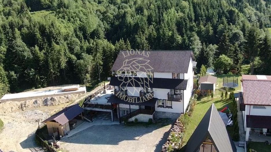 Pensiune turistica Colibita-10 camere-teren-ciubar-sauna-Investitie - Poză 1