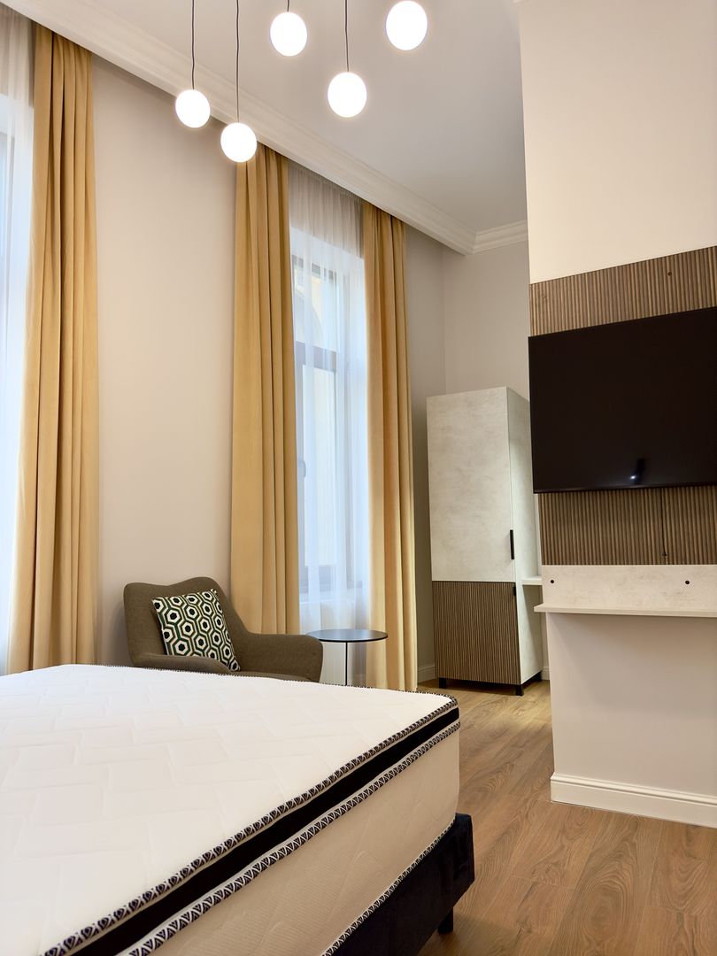 Magheru: 5 camere cu băi proprii – ideal business sau birouri - Poză 16