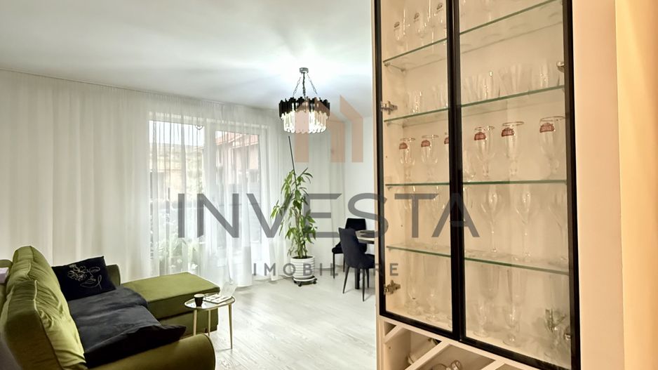 Locuință elegantă cu terasă generoasă și parcare subterană - Poză 4