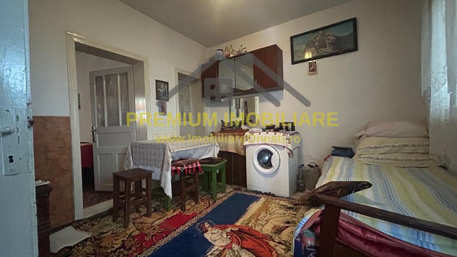 Casă batraneasca+ teren 999 mp intravilan în Oituz - Poză 12