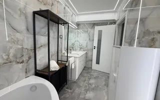 Casa P+1+M cu teren de 650 mp, piscina si curte complet amenajata - Poză 31